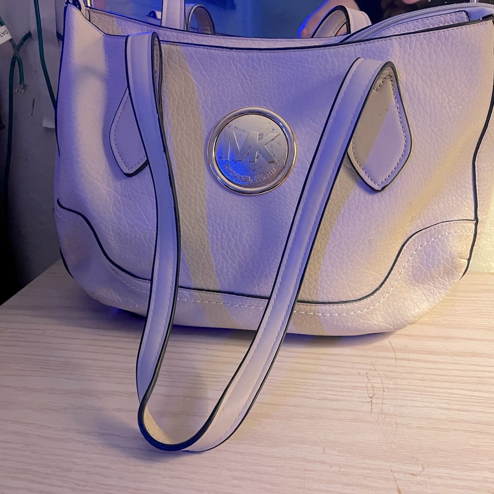 Michael Kors woman’s handbag.